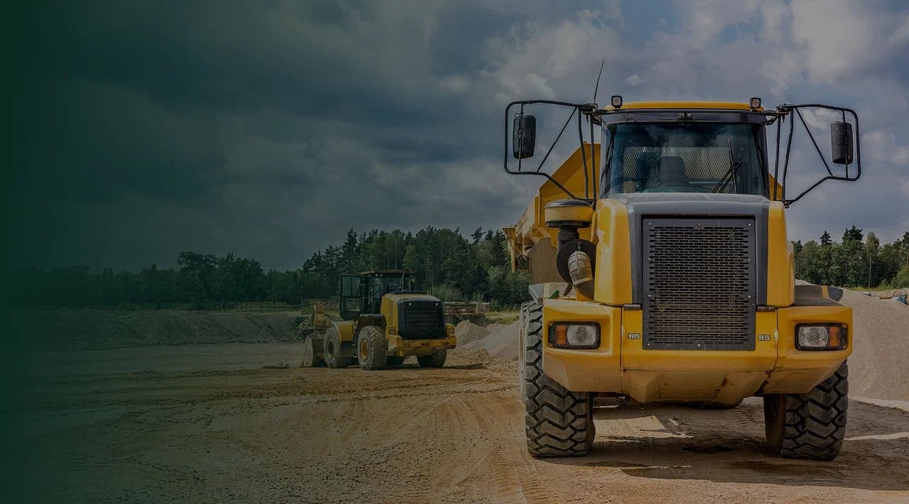 Equipment lined up across the dealership yard
